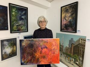 Virginia Griem Showing her Artwork