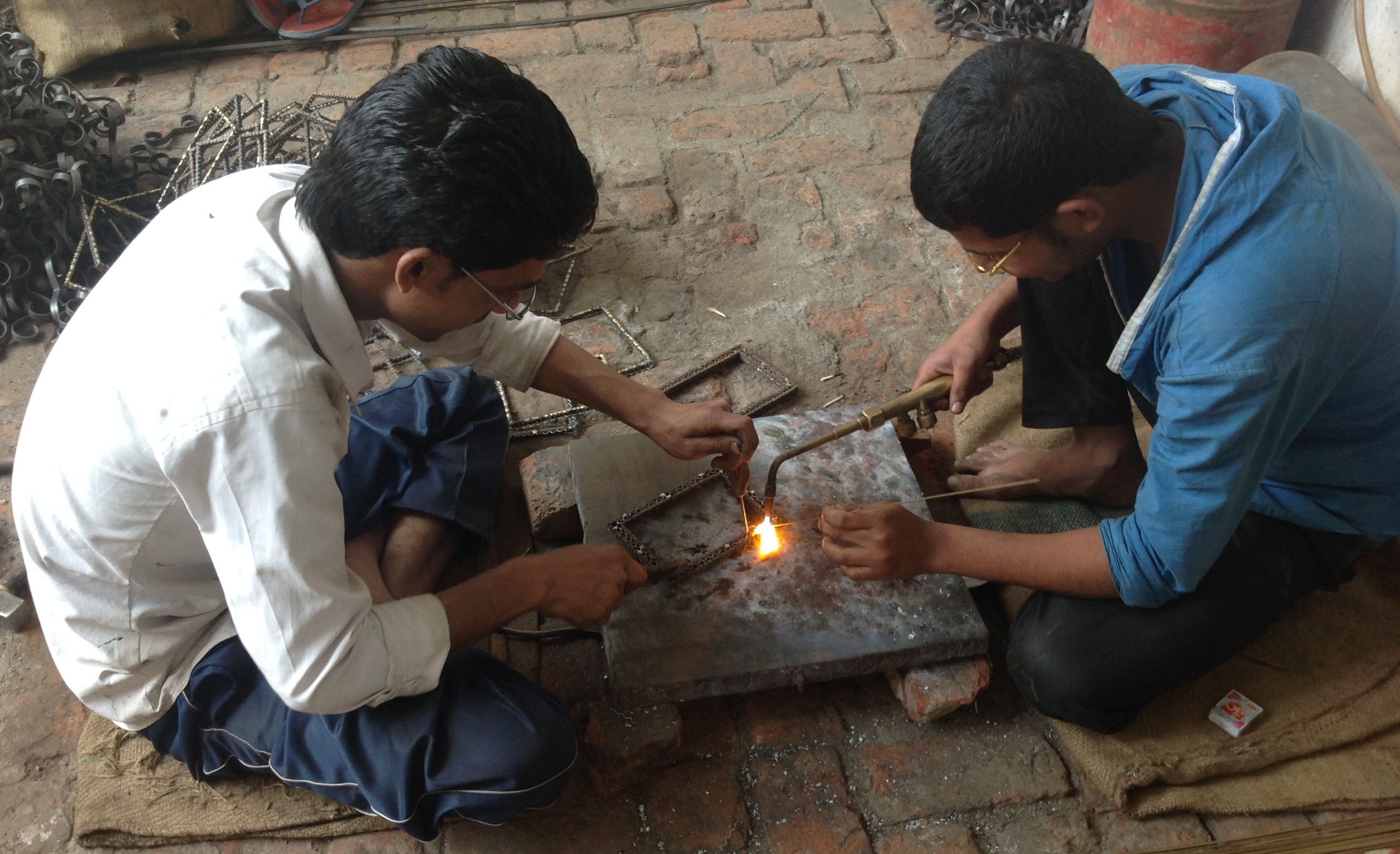 Fair Trade Artisan making Crafts from recycled metal.
