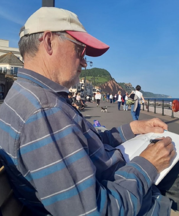 Tony Homer drawing on Teignmouth Seafront