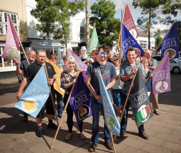 Sam Birtwistle designing Teignmouth Art Quarter Flags
